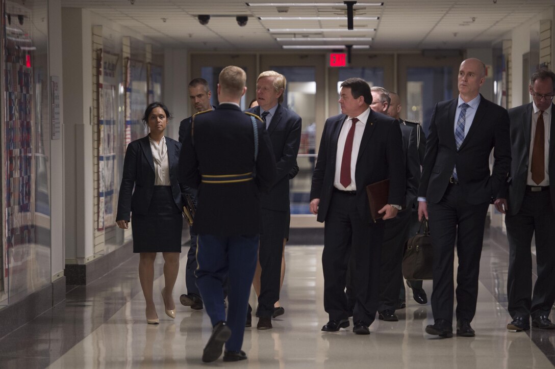 Norwegian State Secretary for Defense Oystein Bo, center right, tours the Pentagon after meeting with Deputy Defense Secretary Bob Work at the Pentagon, March 24, 2016. DoD photo by Air Force Senior Master Sgt. Adrian Cadiz