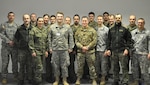 Indiana National Guard Soldiers and members of Slovakia’s Intelligence, Surveillance, Target Acquisition and Reconnaissance Battalion pose for a group photo during a visit to Slovakia by the Hoosier Guardsmen in January 2016.