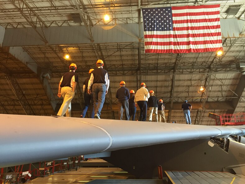 Team Dover honorary commanders experienced a tour of several Total Force maintenance missions March 24, 2016, on Dover Air Force Base, Del. The group observed a C-5M Super Galaxy undergoing an isochronal inspection, learned how the base’s aircraft fleet are de-iced and visited the nation’s largest aerial port. (U.S. Air Force photo/Veronica Aceveda)