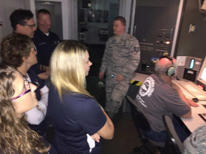 Team Dover honorary commanders experienced a tour of several Total Force maintenance missions March 24, 2016, on Dover Air Force Base, Del. The group observed a C-5M Super Galaxy undergoing an isochronal inspection, learned how the base’s aircraft fleet are de-iced and visited the nation’s largest aerial port. (U.S. Air Force photo/Veronica Aceveda)