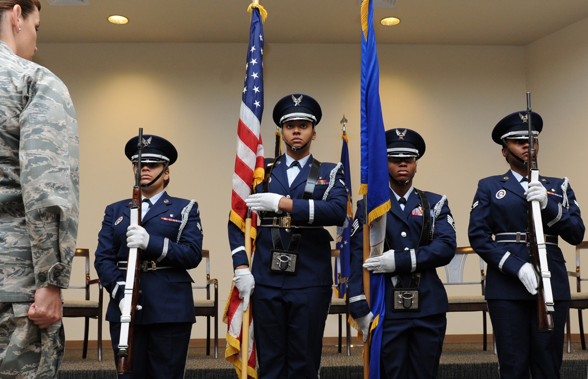 Members of the Keesler Honor Guard post the colors during the National Women’s History Fair at the Roberts Consolidated Maintenance Facility Mar. 24, 2016, Keesler Air Force Base, Miss. The event was held in honor of National Women’s History Month.  Also included, were health and informational booths, a guest panel of accomplished women and a presentation honoring Keesler women of distinction.  (U.S. Air Force photo by Kemberly Groue)