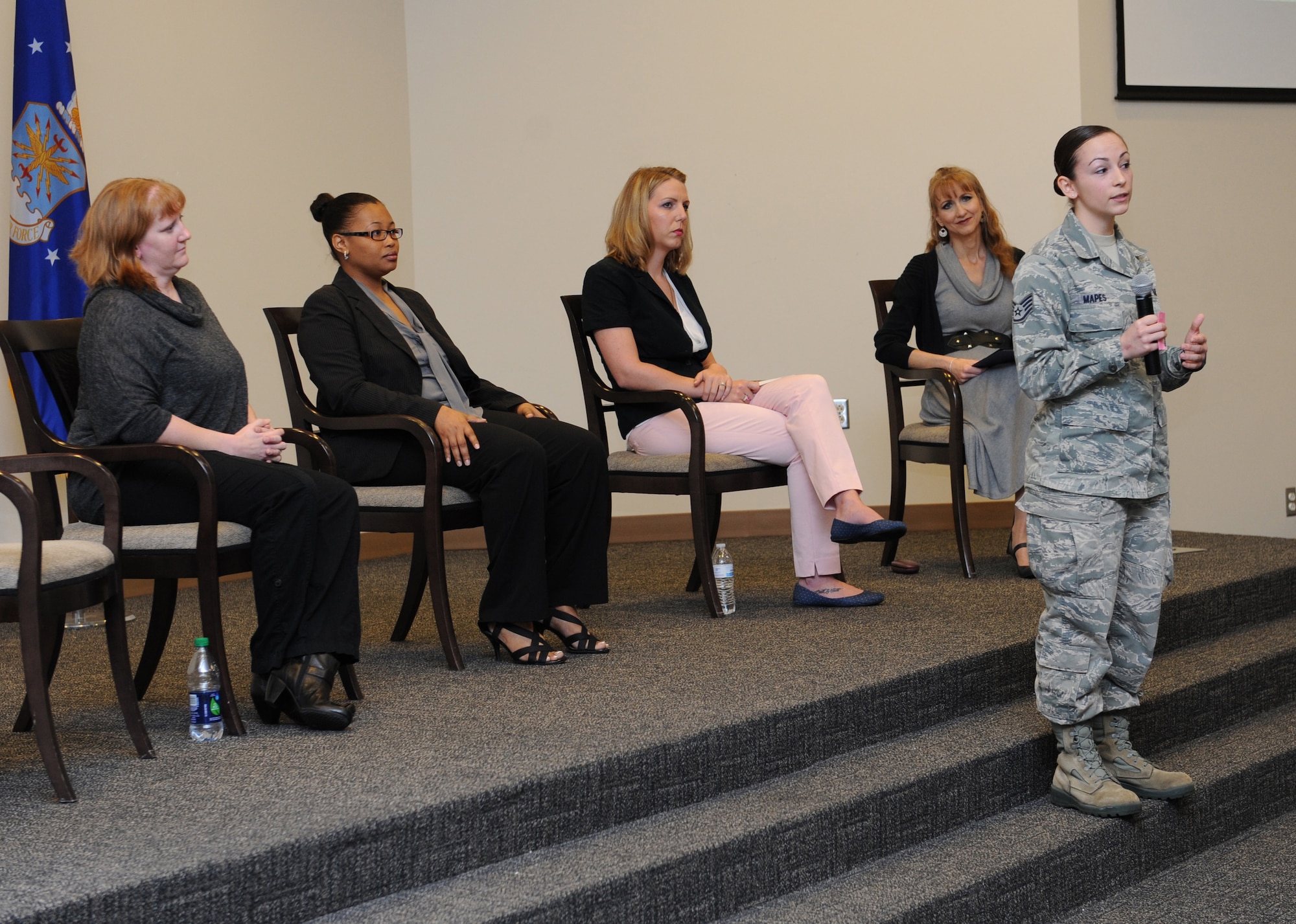 Staff Sgt. Kaytlyn Mapes, 81st Medical Operations Squadron mental health technician, speaks to attendees during the National Women’s History Fair at the Roberts Consolidated Maintenance Facility Mar. 24, 2016, Keesler Air Force Base, Miss. The event was held in honor of National Women’s History Month. Mapes was on the guest panel of five accomplished women who shared their personal story. Also included, were health and informational booths and a presentation honoring Keesler women of distinction.  (U.S. Air Force photo by Kemberly Groue)