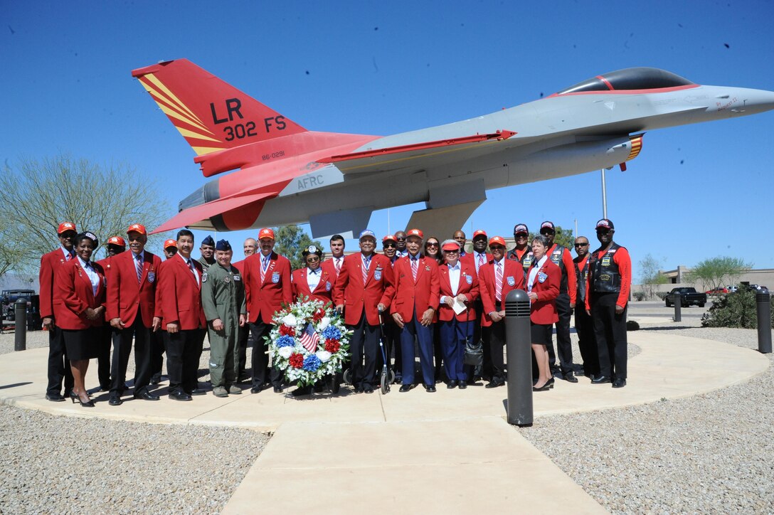 Attendees of the third annual Tuskegee Airmen Commemoration Day ceremony pose for a group photo in front of the iconic, static F-16 Red Tail Mar. 24, 2016 at Luke Air Force Base, Ariz. The ceremony recognized the 75th Anniversary of the Tuskegee Airmen, 10th Anniversary of Archer-Ragsdale Arizona Chapter, and third annual Tuskegee Airmen Commemoration Day in Arizona. 