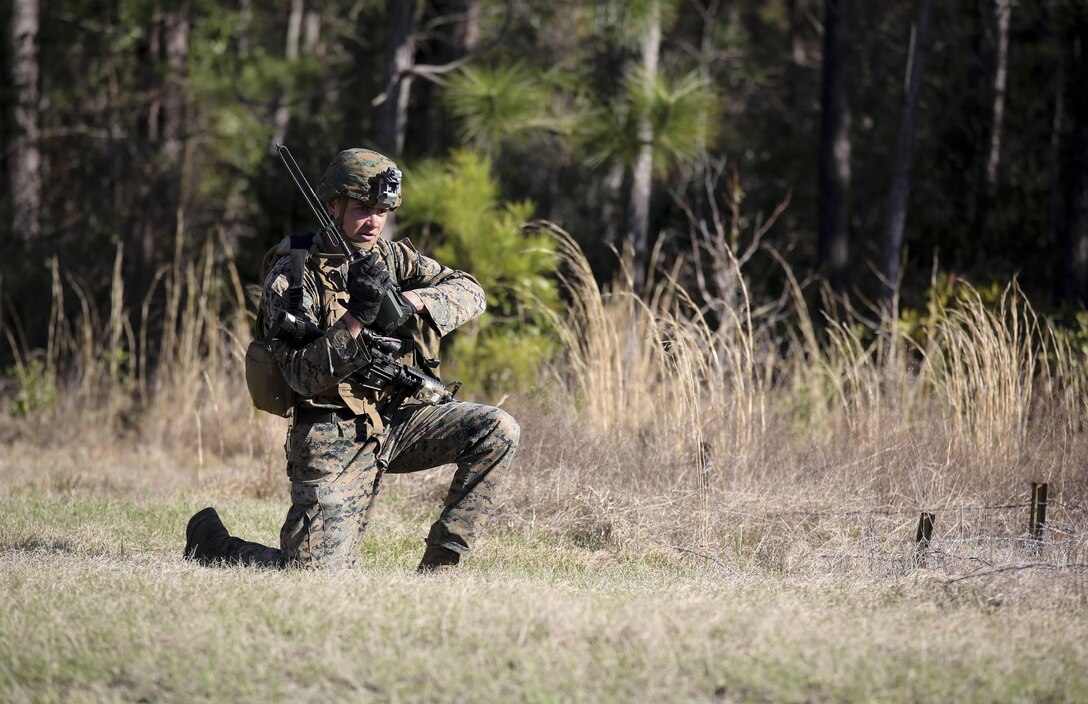 Cpl. Zachary Hannah, a combat engineer with 2nd Combat Engineer Battalion, communicates on a radio during the counter-improvised explosive device operations portion of the battalion’s sapper squad competition at Camp Lejeune, N.C., March 22, 2016. The counter-IED portion of the competition put squads’ observation skills to the test as they swept a lane of simulated IEDs. (U.S. Marine Corps photo by Cpl. Paul S. Martinez/Released)