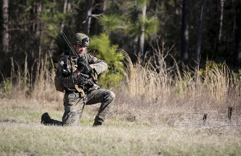 Cpl. Zachary Hannah, a combat engineer with 2nd Combat Engineer Battalion, communicates on a radio during the counter-improvised explosive device operations portion of the battalion’s sapper squad competition at Camp Lejeune, N.C., March 22, 2016. The counter-IED portion of the competition put squads’ observation skills to the test as they swept a lane of simulated IEDs. (U.S. Marine Corps photo by Cpl. Paul S. Martinez/Released)