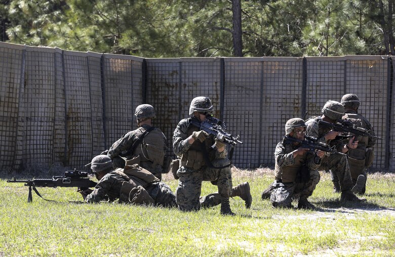 Marines with 2nd Combat Engineer Battalion hold a security position during the assault breaching portion of the battalion’s sapper squad competition at Camp Lejeune, N.C., March 22, 2016. The competition was organized to determine the most proficient squads in the battalion while simultaneously challenging squads in the execution of combat engineer-based tasks. (U.S. Marine Corps photo by Cpl. Paul S. Martinez/Released)