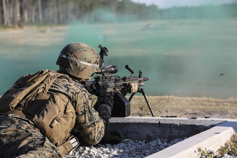 A Marine with 2nd Combat Engineer Battalion engages targets with an M249 squad automatic weapon during the machine gun range portion of the battalion’s sapper squad competition at Camp Lejeune, N.C., March 23, 2016. During this event, squads worked together to engage targets at ranges up to 800 meters. (U.S. Marine Corps photo by Cpl. Paul S. Martinez/Released)