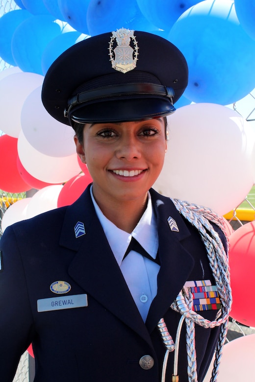 Air Force Cadet Col. Jasmin Grewal, a senior at Royal High School in Simi Valley, Calif., is the recipient of the selective U.S. Marine Corps Naval Reserve Officers Training Corps (NROTC) scholarship, and was awarded the $180,000 check at the high school, March 24, 2016. Grewal won the scholarship based on her commitment in and out of the classroom, to the community, leadership abilities, and physical fitness, and plans to attend Yale University. (U.S. Marine Corps photo by Staff Sgt. Alicia R. Leaders/Released) 