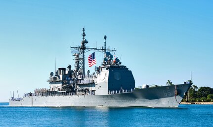 PEARL HARBOR (Nov. 22, 2013) The Ticonderoga-class guided-missile cruiser USS Chosin (CG 65) arrives at homeport at Joint Base Pearl Harbor-Hickam following a deployment to the western Pacific region. The ship and its crew of nearly 340 Sailors conducted integrated operations with allies and partners during the ship’s six-month deployment including the International Fleet Review held in Sydney, Australia. (U.S. Navy photo by Mass Communication Specialist 3rd Class Diana Quinlan/Released)