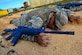 Tech. Sgt. Robert Alsup, 36th Civil Engineer Squadron  horizontal repair NCO in charge, practices a low crawl during a Prime Base Engineer Emergency Force exercise March 24, 2016, at Andersen Air Force Base, Guam. The main exercise objective was to develop and maintain a highly skilled, agile military combat support force capable of rapid response in support of worldwide contingency operations. (U.S. Air Force Photo/Airman 1st Class Alexa Ann Henderson)
