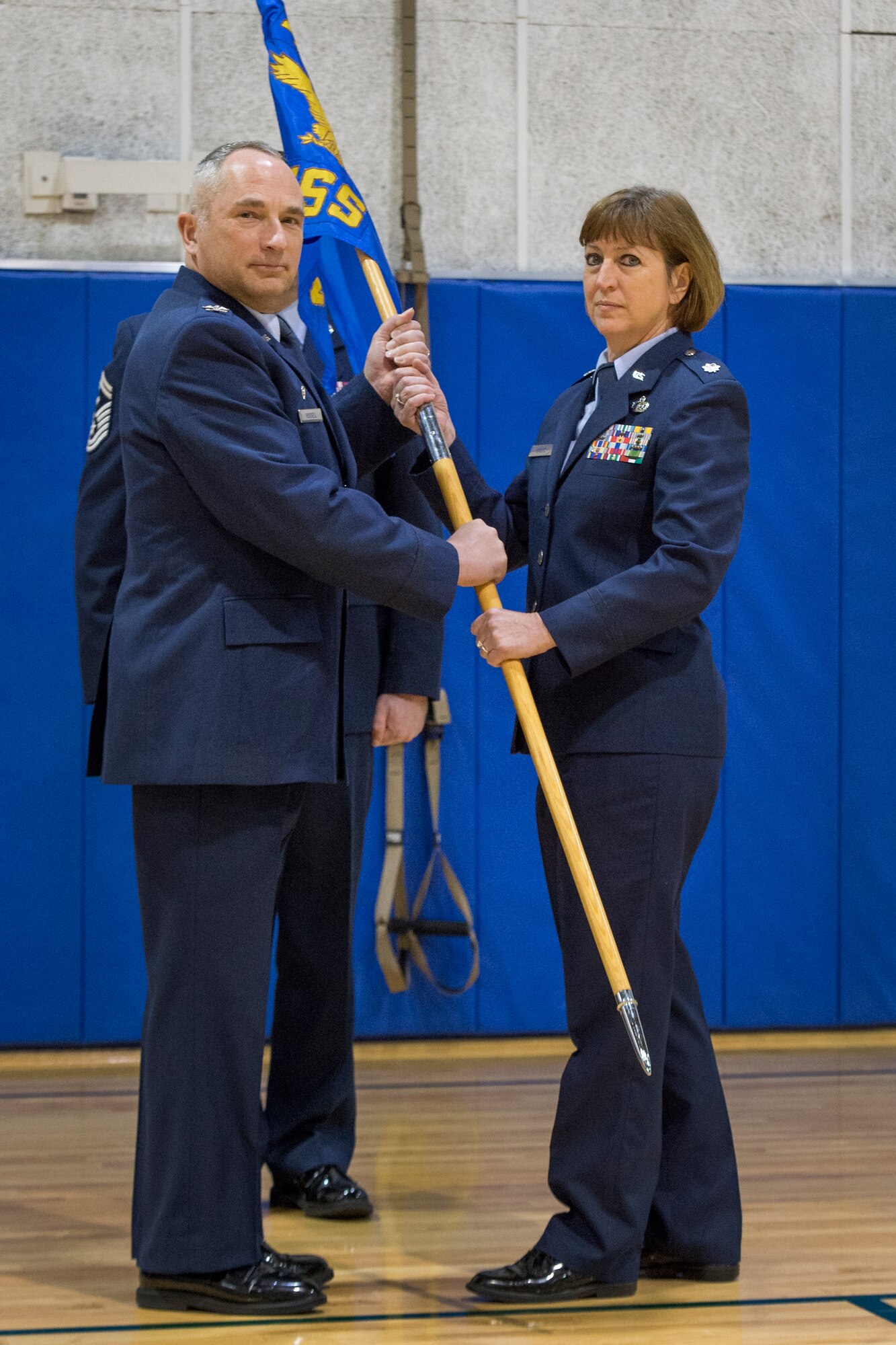 Lt. Col. Barbara Cheeks, 434th Force Support Squadron commander, receives the 434th FSS guidon from Col. Scott Russell, 434th Mission Support Group commander, during an assumption of command ceremony at Grissom Air Reserve Base, Ind., March 5, 2016. Cheeks holds a Master’s degree in public administration from Southern Illinois University, Edwardsville, Illinois and a Bachelor’s of Science degree from Northeastern Illinois University, Chicago. (U.S. Air Force photo/Tech. Sgt. Benjamin Mota)