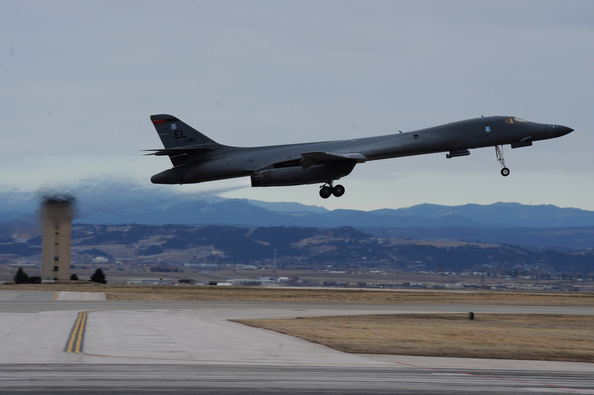 A B-1 bomber assigned to the 37th Bomb Squadron takes off from the Ellsworth Air Force Base, S.D., flightline March 18, 2016. Ellsworth is scheduled to receive its first Sustainment-Block 16 upgrade in April and upgrades include the Vertical Situation Display, a Fully Integrated Data Link and a Central Integrated System. (U.S. Air Force photo by Senior Airman Hailey R. Staker/Released)