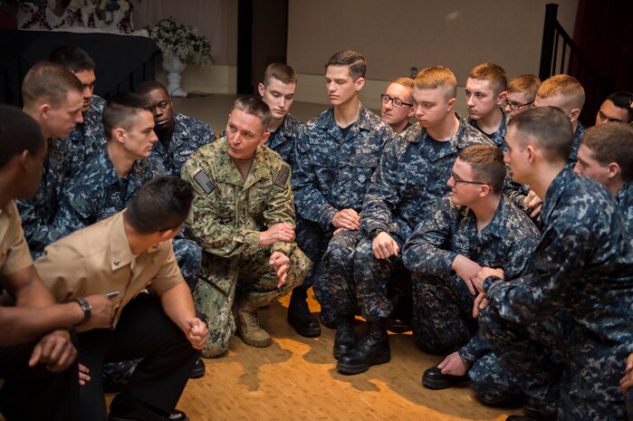 The Master Chief Petty Officer of the Navy, Mike Stevens discusses the importance of mental and physical fitness to Sailors during an all hands event at the Joint Base Charleston – Weapons Station, S.C., March 24, 2016. Stevens was visiting the base as part of a two-week tour of East Coast military bases, from Norfolk, Virgina to Key West Fla. Stevens wanted to communicate face-to-face with Sailors. (U.S. Air Force photo/Staff Sgt. Jared Trimarchi)