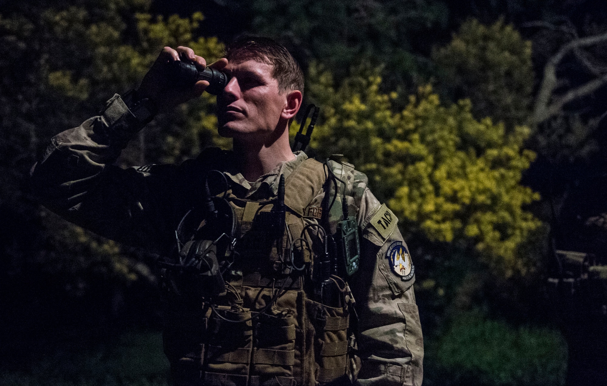 Senior Airman Tormod Lillekroken, 2nd Air Support Operations Squadron joint terminal attack controller, looks through a night vision monocular as part of a night training scenario during Exercise Serpentex ‘16 in Corsica, France, March 15, 2016. Lillekroken recently reached his goal to be qualified as a joint terminal attack controller. Lillekroken has been in the tactical air control party career field for more than four years. (U.S. Air Force photo/Staff Sgt. Sara Keller)