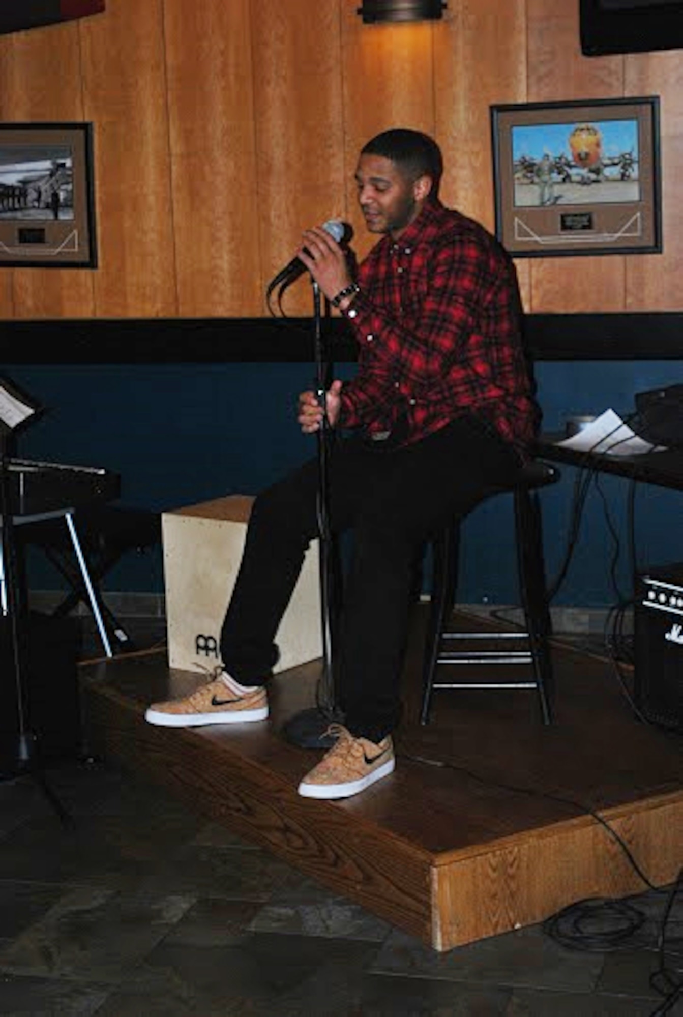 Senior Airman Thaddeus Johnson, 341st Force Support Squadron personnel customer service representative, performs during Malmstrom Air Force Base’s first open mic night, held at the Grizzly Bend Feb. 26, 2016. Future events are scheduled to take place the last Friday of every month. (Courtesy photo)