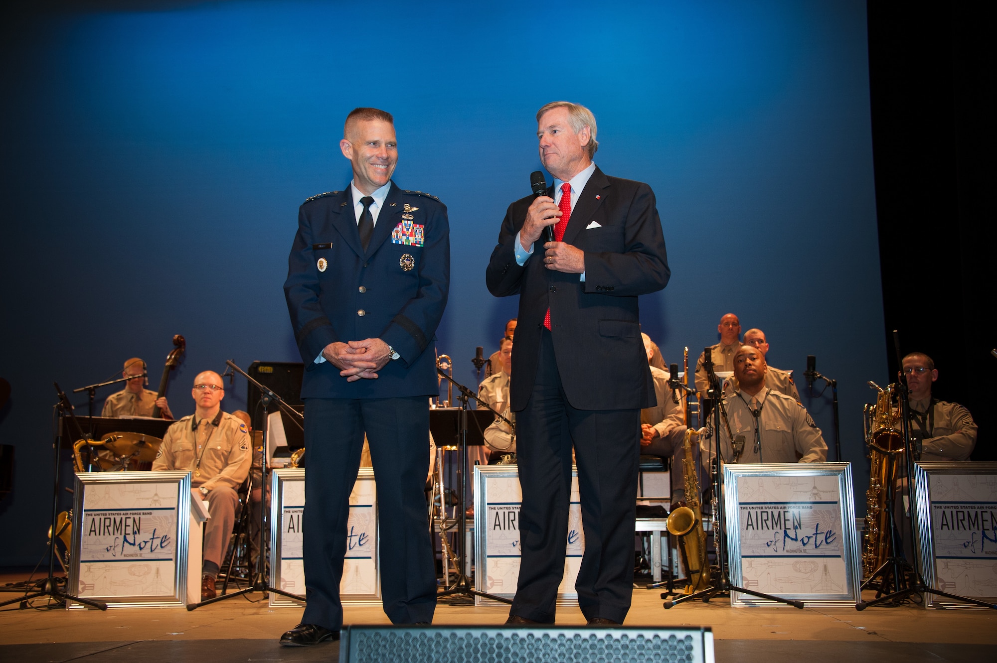 Lt. Gen. Steven Kwast, Air University
commander, and Montgomery Mayor Todd Strange provide opening remarks at the
Glenn Miller Holiday Concert at Troy University's Davis Theatre, Dec. 4,
2014. Montgomery won the 2015 Altus Trophy for its outstanding support to an
Air Education and Training Command base throughout the year. (U.S. Air Force
photo by Melanie Rodgers Cox)
