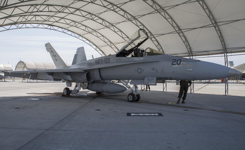 An F/A-18C Hornet with Marine Fighter Attack Squadron (VMFA) 122, sits on the flightline at Marine Corp Air Station Iwakuni, Japan, March 22, 2016. VMFA-122, also known as the “Werewolves,” arrived in Iwakuni March 14 from MCAS Beaufort, S. C. for a six month rotation with the unit deployment program. The Werewolves’ overall mission is to destroy surface targets and enemy aircraft day or night under all weather conditions during expeditionary, joint and combined operations.(U.S. Marine Corps photo by Cpl. Nicole Zurbrugg/Released) 