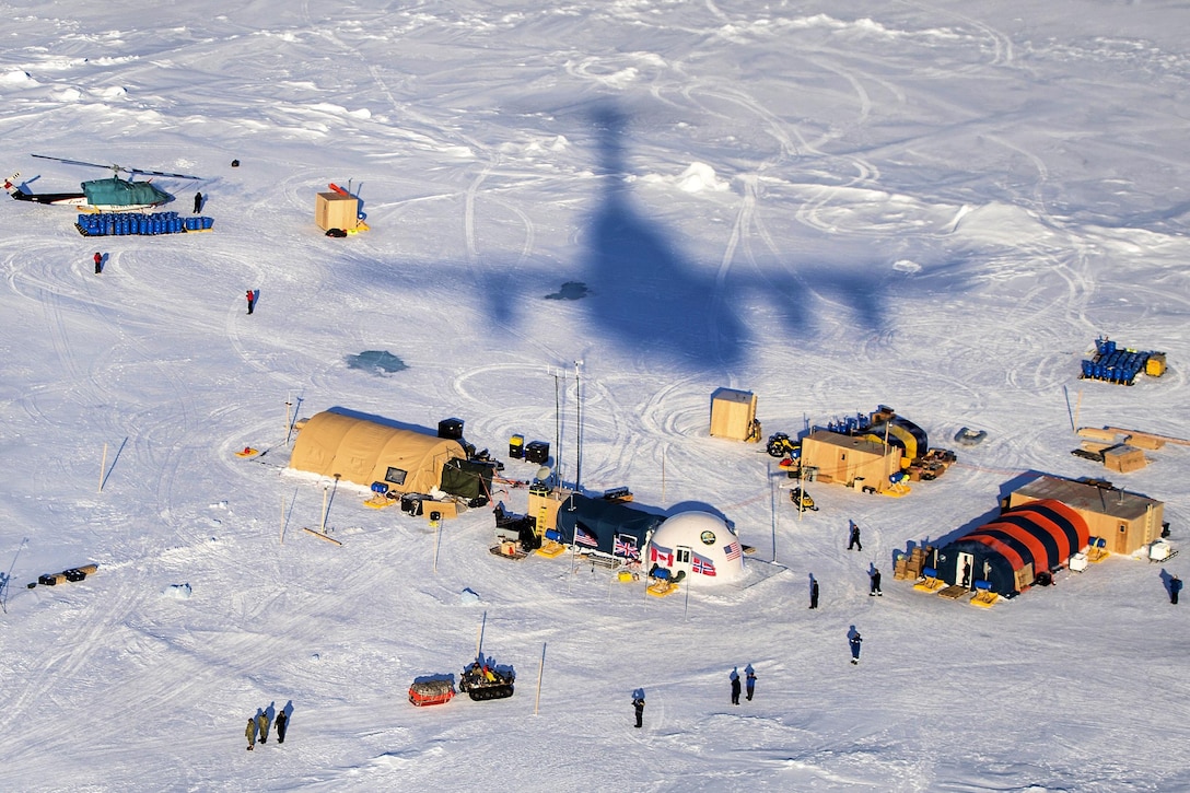 An Air Force C-17 Globemaster III aircraft flies over Ice Camp Sargo to support Ice Exercise 2016 in the Arctic Circle, March 15, 2016. Air Force photo by Senior Airman James Richardson