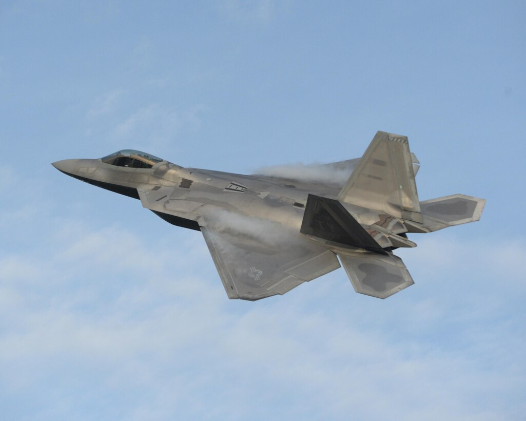 An F-22 Raptor from Tyndall Air Force Base, Fla., prepares to land at MacDill AFB, Fla., March 18, 2016, for AirFest 2016. The F-22 was set up as a static display for visitors to get a close-up look at the world’s best air dominance fighter. (U.S. Air Force photo/Airman 1st Class Cody R. Miller)