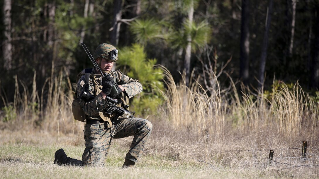 Cpl. Zachary Hannah, a combat engineer with 2nd Combat Engineer Battalion, communicates on a radio during the counter-improvised explosive device operations portion of the battalion’s sapper squad competition at Marine Corps Base Camp Lejeune, North Carolina, March 22, 2016. The counter-IED portion of the competition put squads’ observation skills to the test as they swept a lane of simulated IEDs.