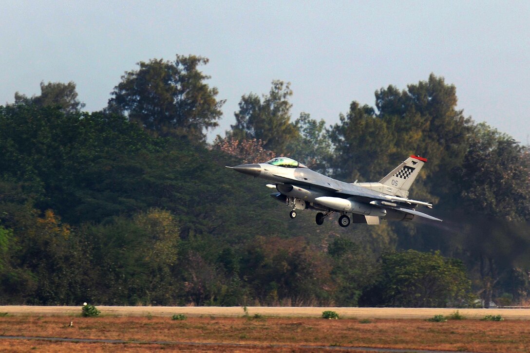 An Air Force F-16 Fighting Falcon aircraft piloted by Air Force 1st Lt. Brittany Trimble takes off at Korat Royal Thai Air Force Base, Thailand, March 15, 2016. Trimble is a pilot assigned to the 36th Fighter Squadron. Air Force photo by Staff Sgt. Amber E. Jacobs