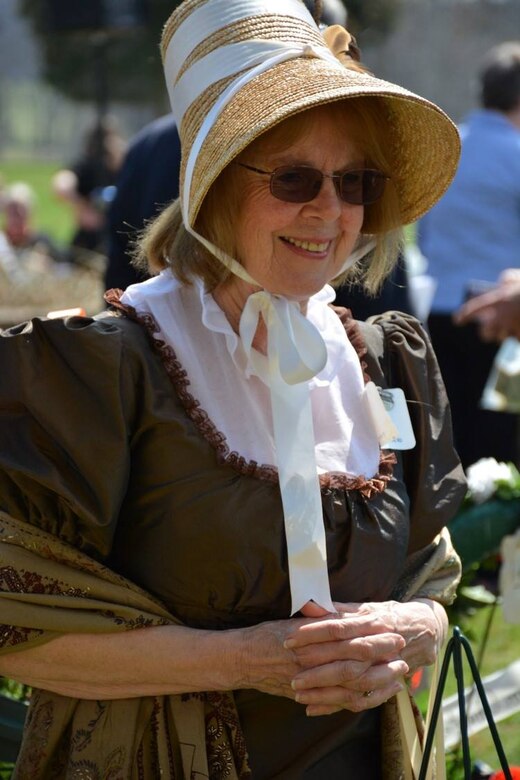 A woman in period dress pays her respects during the annual James Madison Wreath-Laying Ceremony held at Montpelier, March 16.