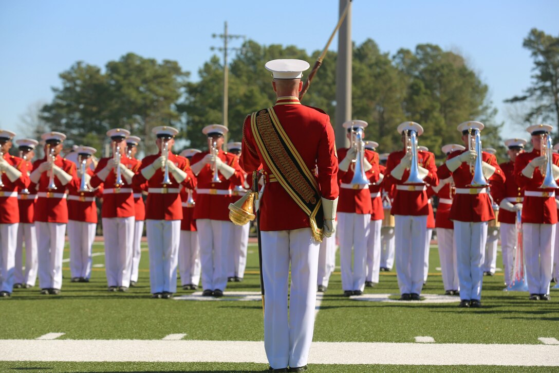 The “Commandant’s Own” Marine Corps Drum and Bugle Crops, executes precise close order drill during the 2016 Battle Colors Ceremony, Mar. 17 at Marine Corps Base Camp Lejeune. The Drum and Bugle Corps represents over 80 years of dedicated musicians who have served through relentless dedication to their craft and continuous practicing.