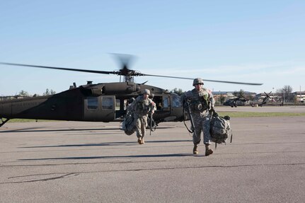 Competitors in the 84th Reserve Training Command, 11th Aviation and Army Reserve Careers Division make movement to their next event in the competition on March 22nd, 2016 at Ft. Knox, Kentucky. The Best Warrior Competition is a four-day competition that tests competitors' Army aptitude by going through urban warfare situations, board interviews, physical fitness tests, written exams, Warrior tasks and battle drills relevant to today's operational environment. (U.S. Army photo by Sgt. Amber Stephens)