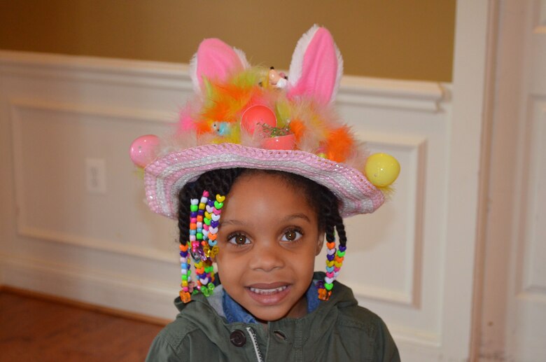 MARINE CORPS BASE QUANTICO, Va. — Zariya, 4, shows off her colorful handmade Easter hat during the annual Easter Egg Hunt held Saturday aboard Marine Corps Base Quantico. 
