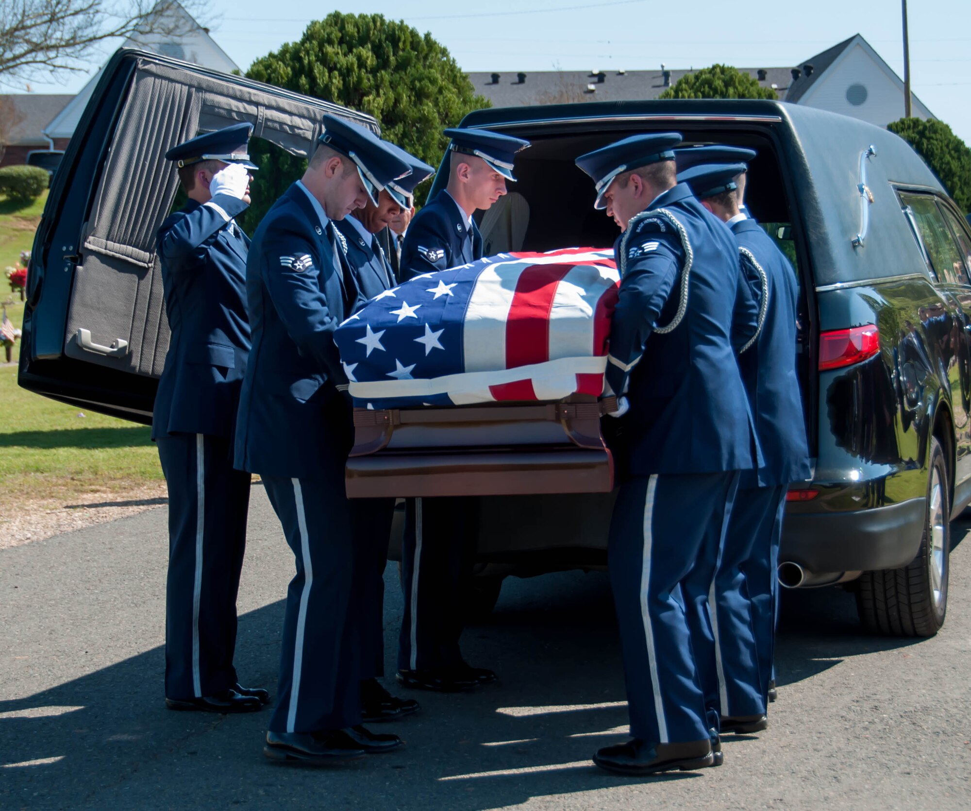 A U.S. Air Force Honor Guard team from Barksdale Air Force Base, La. serves as pallbearers during the funeral for Retired Chief Master Sgt. Layton Wehling, March 22, 2016 at Hillcrest Cemetery in Bossier City, La. Wehling continued to work as a civilian in the 307th Bomb Wing after retiring from the Air Force Reserves in 1991. Wehling was friend and mentor to many and referred to as “The Chief”. (U.S. Air Force photo by Master Sgt. Laura Siebert/Released)