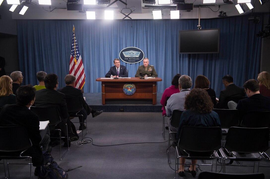 Defense Secretary Ash Carter and Marine Corps Gen. Joe Dunford, chairman of the Joint Chiefs of Staff, speak about coalition efforts to dismantle the Islamic State of Iraq and the Levant during a news conference at the Pentagon, March 25, 2016. DoD photo by Navy Petty Officer 1st Class Tim D. Godbee