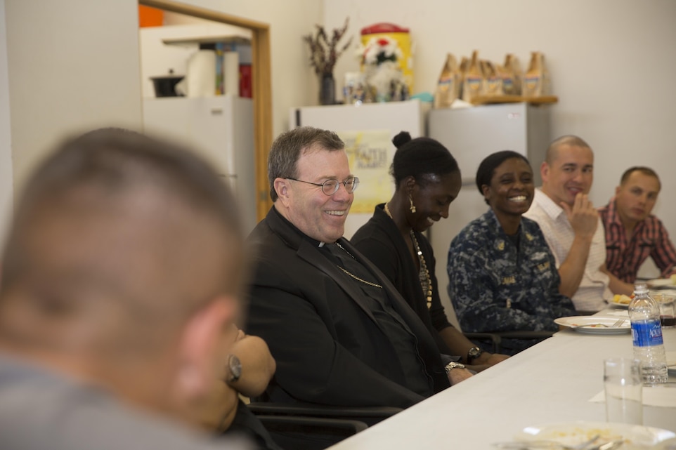 Bishop Neal J. Buckon, Military Archdiocese Vicar for the Western Region, speaks with Marines, sailors and church members during a pastoral visit at the Combat Center’s Catholic Chapel, March 19, 2016. (Official Marine Corps photo by Cpl. Connor Hancock/Released)