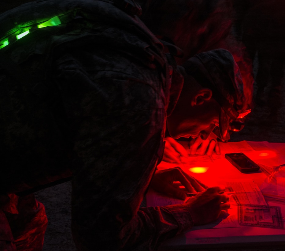 Soldiers competing in the 108th Training Command's 2016 combined Best Warrior and Drill Sergeant of the Year competition wrapped up the first night of competition with a night land navigation course at Fort Jackson, S.C.,  March 21. (U.S. Army photo by Sgt. 1st Class Brian Hamilton/released)