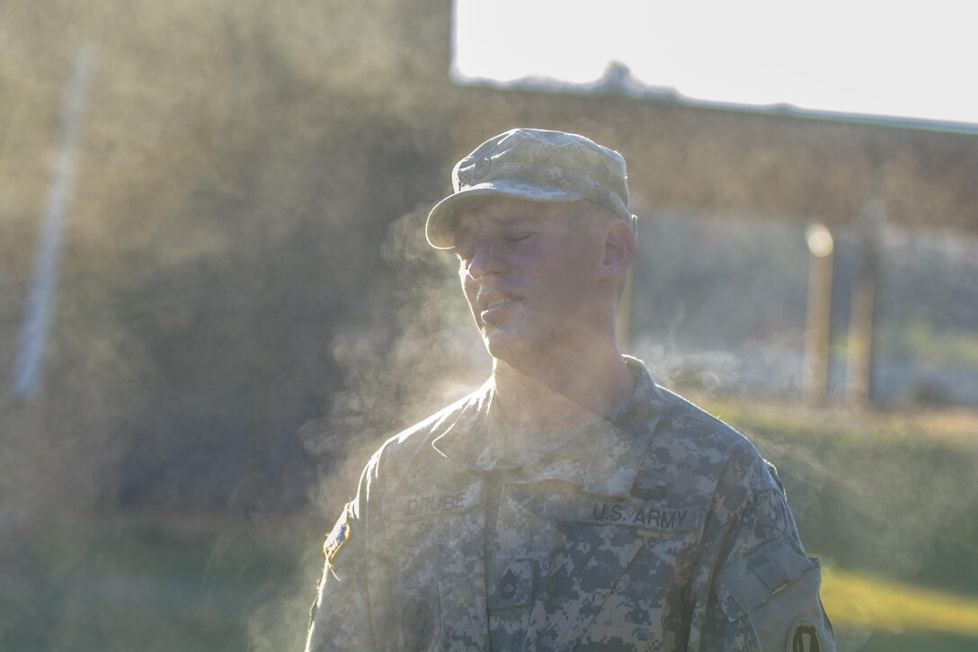 Army Reserve drill sgt., Sgt. 1st Class Kyle Drube, 95th Training Division, attempts to cool down after completing the 12-mile foot march at the 2016 108th Training Command (IET) Drill Sergeant of the Year Competition at Fort Jackson, S.C., March 22. This year's Drill Sergeant of the Year competition will determine the top two drill sgts. who will represent the 108th Training Command (IET) in the TRADOC Drill Sgt. of the Year competition later this year at Fort Jackson, S.C. (U.S. Army photo by Sgt. 1st Class Brian Hamilton/released)