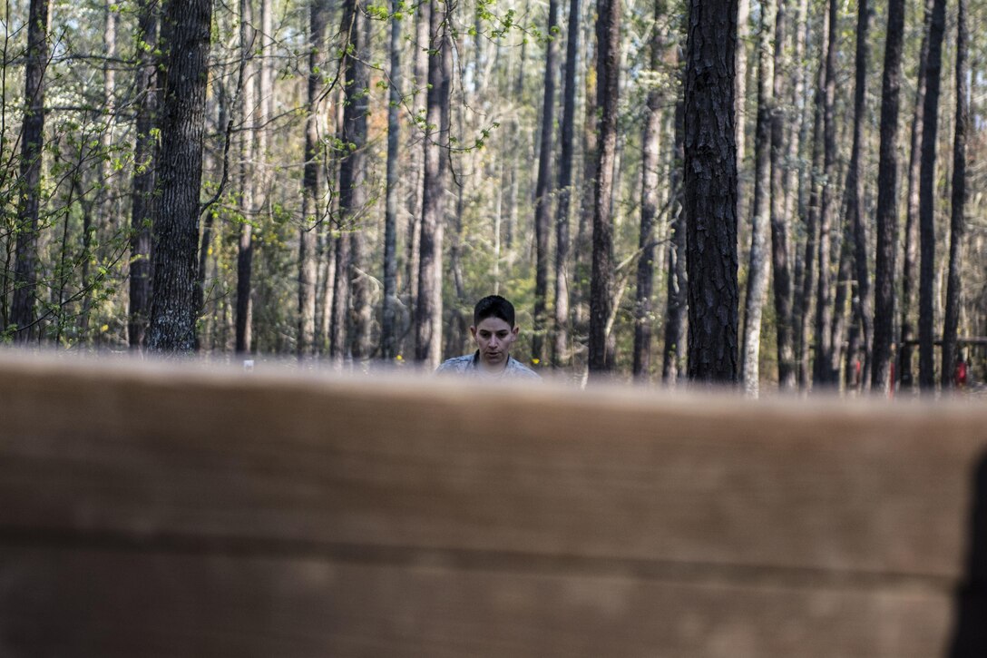 Staff Sgt. Beth Juliar, representing 4th Bde., 98th Training Division (IET), approaches the low wall at the endurance obstacle course during the 2016 108th Training Command (IET) Best Warrior Competition held at Fort Jackson, S.C., March 23. This year's Best Warrior competition will determine the top noncommissioned officer and junior enlisted Soldier who will represent the 108th Training Command (IET) in the Army Reserve Best Warrior competition later this year at Fort Bragg, N.C. (U.S. Army photo by Sgt. 1st Class Brian Hamilton/released)