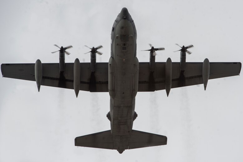 A U.S. Air Force C-130 Hercules takes off from Joint Base Elmendorf Richardson to conduct a training sortie, March 24, 2016.  Training sorties are imperative to pilot development and overall mission effectiveness. (U.S. Air Force photo by Senior Airman James Richardson/Released)