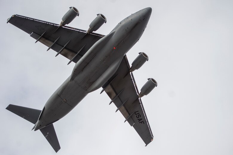 A U.S. Air Force C-17 Globermaster III takes off from Joint Base Elmendorf Richardson to conduct a training sortie, March 24, 2016. Training sorties are imperative to pilot development and overall mission effectiveness. (U.S. Air Force photo by Senior Airman James Richardson/Released)