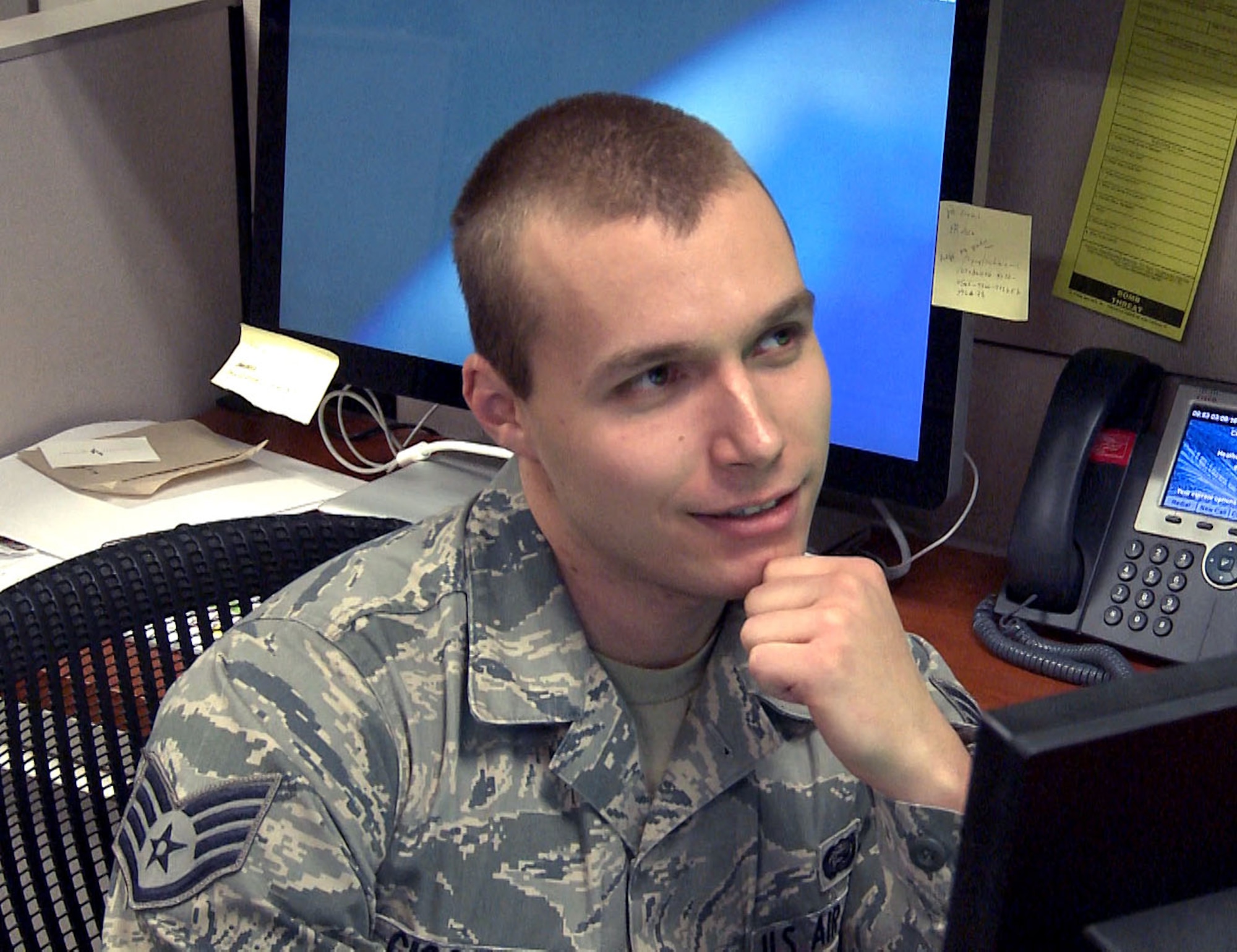 Staff Sgt. Mitchell Ciccarelli, Air Reserve Personnel Center casualty services technician, discusses a video filmed in the ARPC public affairs studio March 9, 2016, on Buckley Air Force Base, Colo. Ciccarelli was selected as the 2015 Headquarters Air Force Reserve Command Airman of the Year (U.S. Air Force photo/Quinn Jacobson)