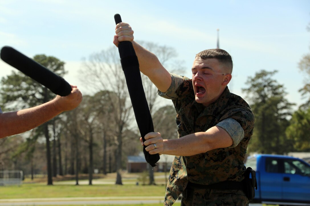 Lance Cpl. Brandon Murdock participates in an obstacle course during non-lethal weapons training at Marine Corps Air Station Cherry Point, N.C., March 17, 2016. Twelve Marines from various units participated in the training event with the Provost Marshal‘s Office. Marines were sprayed in the face with the potent substance and then maneuvered through an obstacle course simulating non-compliant threats. The training familiarized the participants with both the gear they will carry and the effects it will have on an individual being sprayed. Murdock is an avionics technician with Marine Aviation Logistics Squadron 14. (U.S. Marine Corps photo by Cpl. N.W. Huertas/Released)