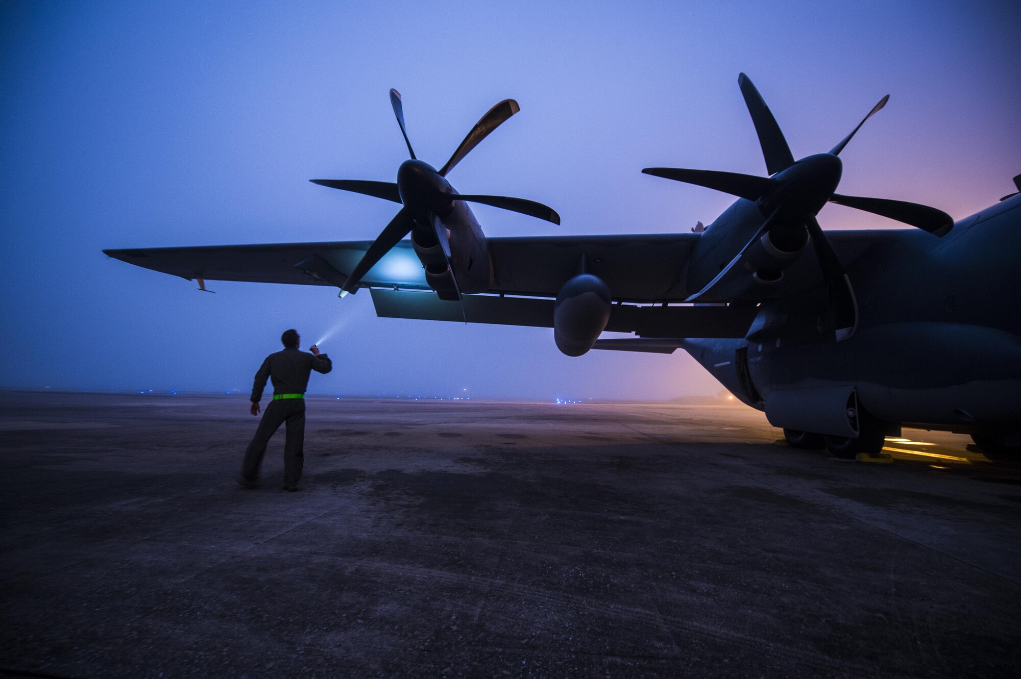 Staff Sgt. Derek Watson, a special missions aviator with the 1st Special Operations Group Detachment 2, inspects a wing of an AC-130J Ghostrider during a pre-flight inspection at Hurlburt Field, Fla., Feb. 2, 2016. Special mission aviators have multiple integral roles and monitor all functions for the aircraft, even providing weapon defense when necessary. (U.S. Air Force photo by Staff Sgt. Christopher Callaway) 