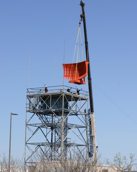 A crane removes an antenna from a Digital Airport Surveillance Radar unit at Laughlin Air Force Base, Texas, March 22, 2016. The DASR keeps track of air traffic within Laughlin’s airspace. (U.S. Air Force photo by Senior Airman Jimmie D. Pike)