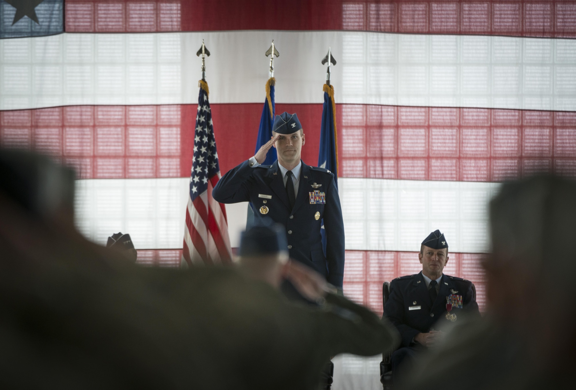 Col. Jefferson O'Donnell. 366th Fighter Wing commadner, renders his first salute as the wing commander, March 24, 2016, at Mountain Home Air Force Base, Idaho. O'Donnell acted as the vice wing commander for the previous nine months. (U.S. Air Force photo by Tech. Sgt. Samuel Morse/RELEASED)