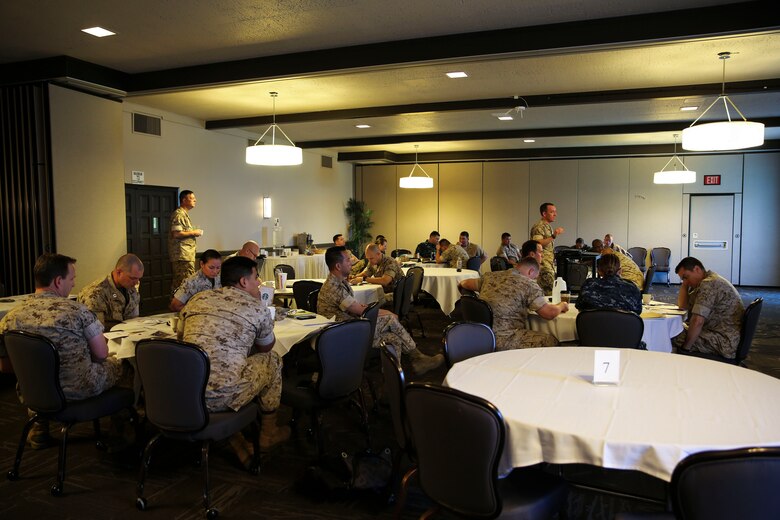 Navy medical personnel receive instruction before beginning the practical application portion of a SoCal Medical Planning Symposium aboard Marine Corps Air Station Miramar, Calif., March 25. This was the third time the I Marine Expeditionary Force Surgeon’s Office has hosted this event with the intent to broaden medical personnel’s basic knowledge of the medical planning process. (U.S. Marine Corps photo by Cpl. Alissa P. Schuning/Released)