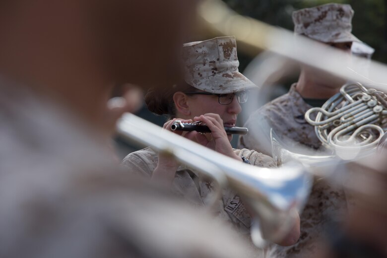Lance Cpl. Samantha Spiezio, a flute instrumentalist with the 3rd MAW Band and Saratoga Springs, N.Y. native, practices with a piccolo aboard Marine Corps Air Station Miramar, Calif., March 22. Spiezio is the only flute instrumentalist in the 3rd MAW Band and often plays the piccolo during marching performances. (U.S. Marine Corps photo by Sgt. Lillian Stephens/Released)