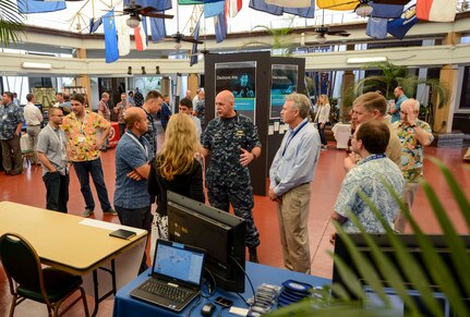 PEARL HARBOR (March 24, 2016) Adm. Scott Swift, commander, U.S. Pacific Fleet speaks with participants of the Integrated Air and Missile Defense (IAMD) Mission Planning Tactical Advancements for the Next Generation (TANG) seminar March 24. The TANG brings government civilians, contractors, enlisted and officer personnel together with commercial enterprises to tackle challenges through innovation. (U.S. Navy photo by Mass Communication Specialist 2nd Class Brian M. Wilbur/Released)