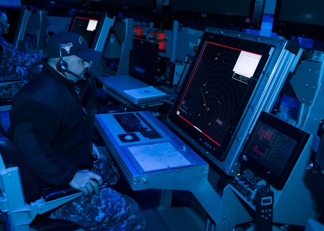 160322-N-DI878-097 (March 22, 2016) SAN DIEGO – USS Carl Vinson (CVN 70) Chief Air Traffic Controller Keith Thompson demonstrates the first air traffic control simulator installed on board a Navy aircraft carrier in the aircraft carrier USS Carl Vinson air traffic control center (CATCC). Carl Vinson is currently pierside in its homeport of San Diego. (U.S. Navy photo by Mass Communication Specialist 3rd Class Giovanni Squadrito/Released)