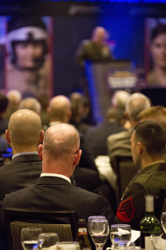U.S. Marines and guests listen to Commandant of the Marine Corps Gen. Robert B. Neller speak during the 12th Marine Corps Association and Foundation Ground Logistics Awards dinner at the Crystal Gateway Marriot, Arlington, Va., March 24, 2016. The annual event recognized the professional achievements of the top performing Marine logisticians and logistics unit of the year for the previous year. (U.S. Marine Corps photo by Staff Sgt. Gabriela Garcia/Released)