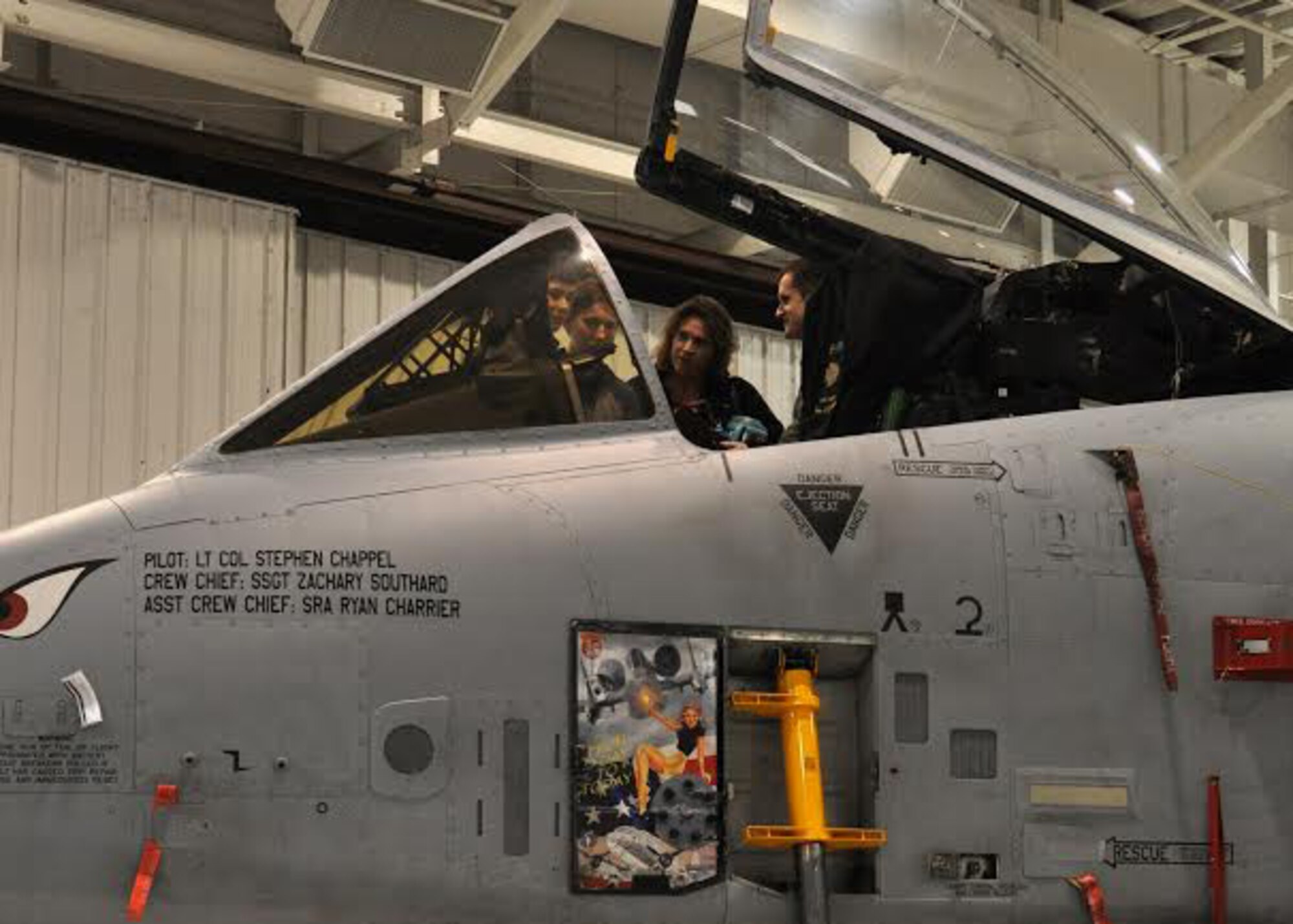 The cockpit of the A-10 Thunderbolt II is opened for students from the Wright Flight Program in Columbia, Mo., to view at Whiteman Air Force Base, Mo., March 24, 2015. The 442nd Fighter Wing is home to 27 A-10s. (U.S. Air Force photo by Airman 1st Class Missy Sterling/Released)     