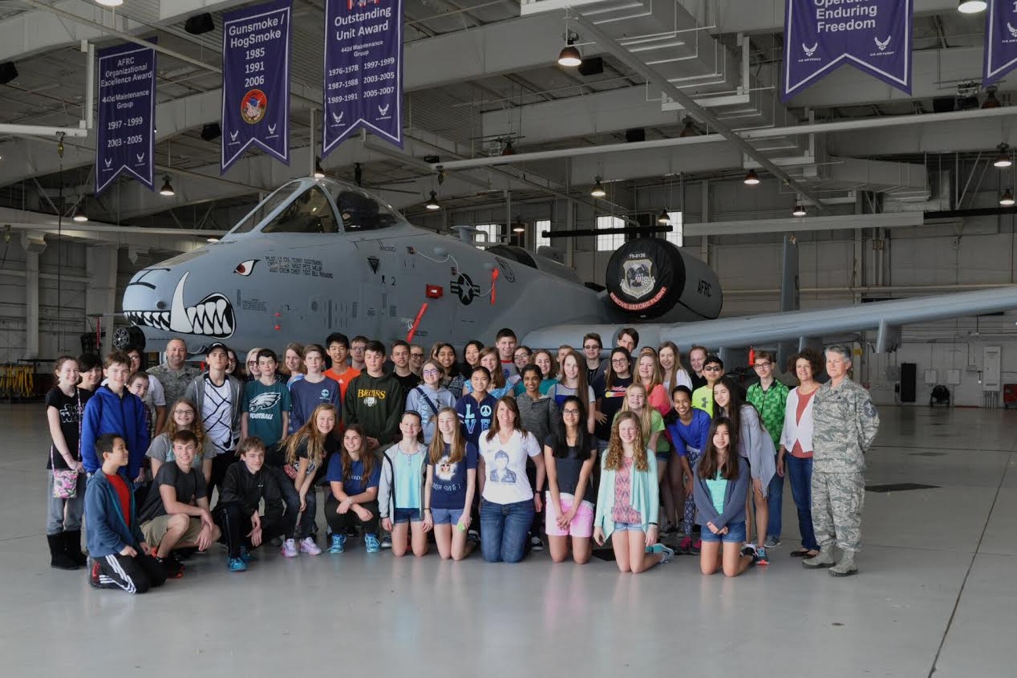 The 442nd Fighter Wing hosts a group of students from the Wright Flight Program in Columbia, Mo., to tour Whiteman Air Force Base March 15, 2016. The Wright Flight Program helps students create and achieve goals while teaching them life lessons from the history of aviation. (U.S. Air Force photo by Airman 1st Class Missy Sterling/Released)   