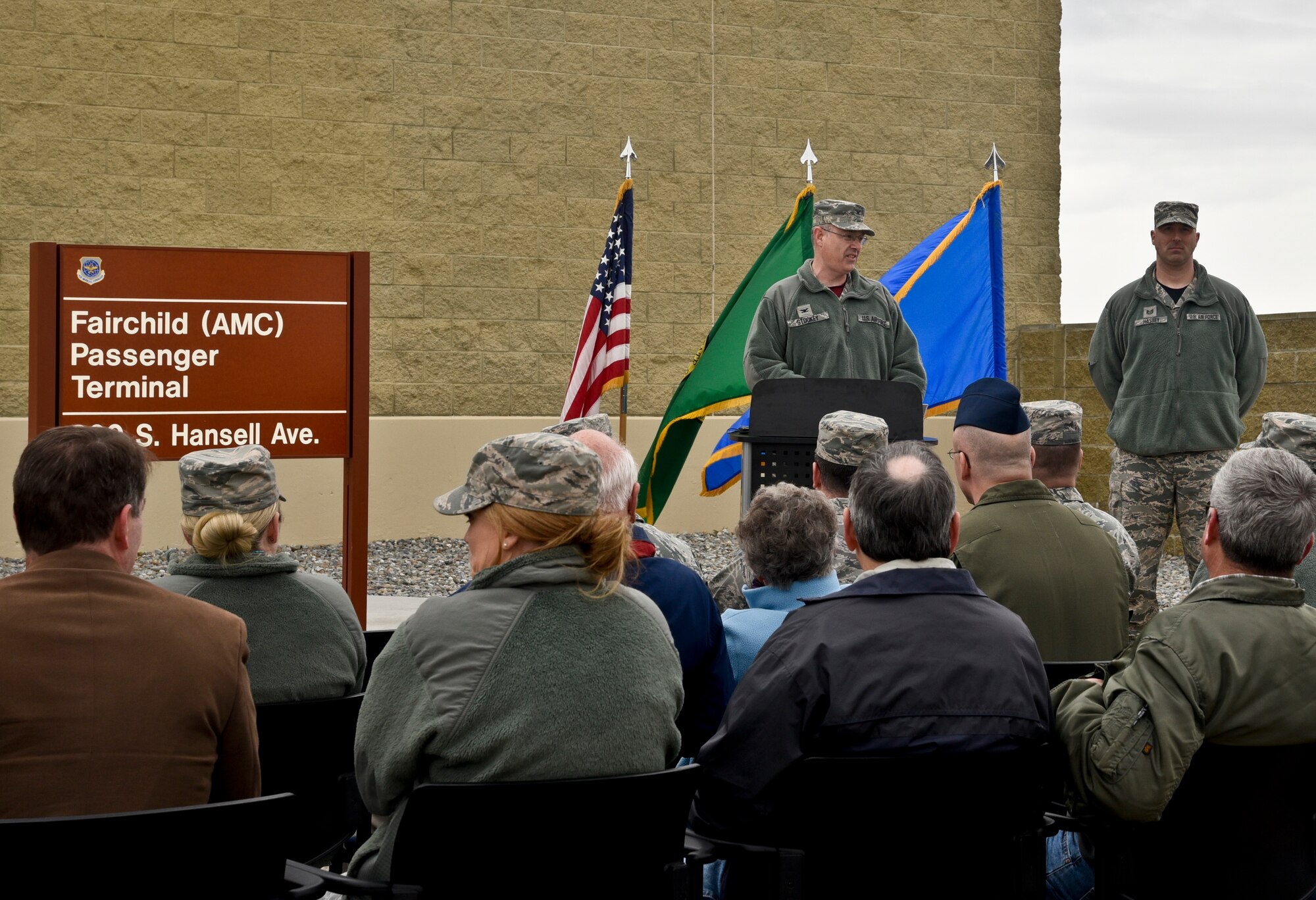 Col. David Stookey, 92nd Mission Support Group commander, speaks during the Ribbon Cutting Ceremony for the new Passenger Terminal March 25, 2016, at Fairchild Air Force Base, Wash. The PAX Terminal provides free flights to other bases for military members and their families. The new terminal now includes restrooms inside the gate, family rooms, children’s play area and a private mommy room. (U.S. Air Force photo/Airman 1st Class Taylor Bourgeous)